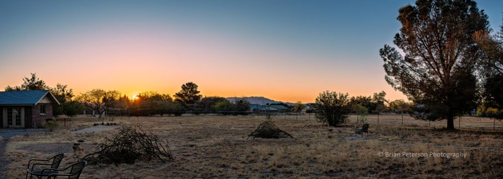 I set up the tripod more towards the left side of the backyard, next to my bird photography spot. See the sun just behind the distant mesquite trees towards the left of the frame.