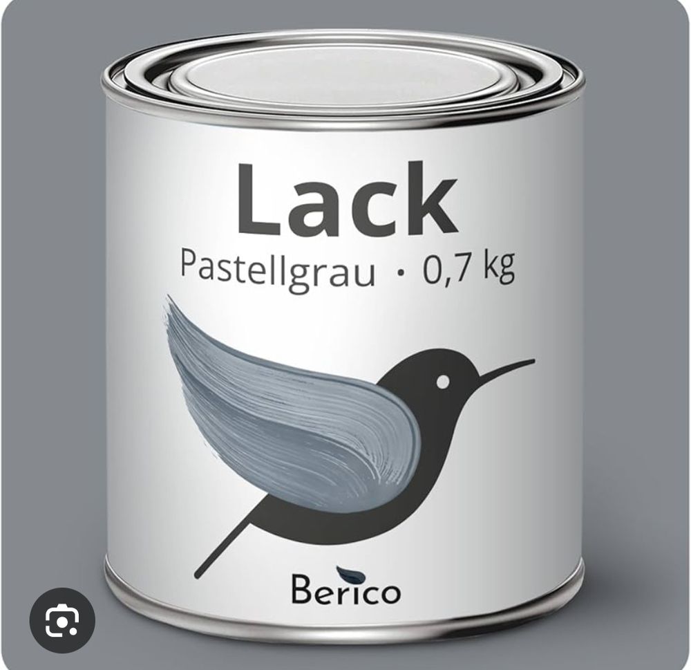 Eine Dose mit Lack in der Farbe pastellgrau mit einem Vogel als Symbol.