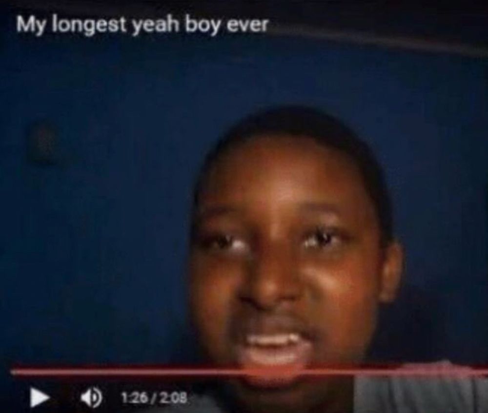 A boy with his mouth open. A young tube header saying My Longest Yeah Boy Ever