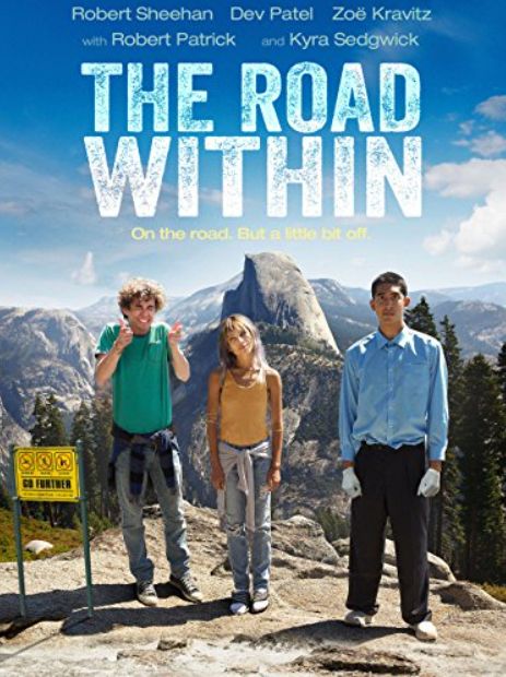 Movie poster art for THE ROAD WITHIN, showing three teens (Robert Sheehan, Zoe Kravitz and Dev Patel) atop a mountain. 