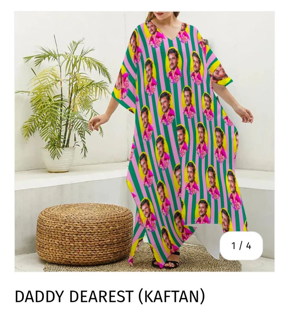 words? no words, they should have sent a poet
it's a kaftan, a sort of long flowy tunic dress thing with pink and blue stripes and a shitload of pictures of Pedro Pascal in a pink shirt