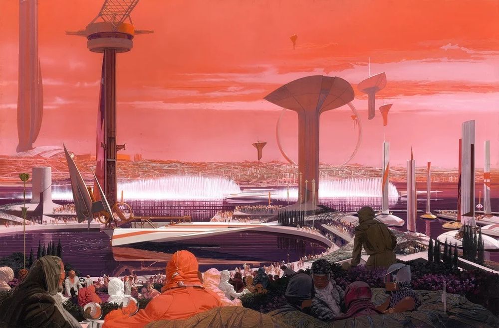 A crowd of onlookers watch futuristic boats in a bay, with a handful of giant futuristic towers in the city in the background, against a pink sky.