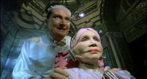 Scene from the film Brazil with actress Katherine Helmond having her face stretched by a mad plastic surgeon played by jim broadbent
