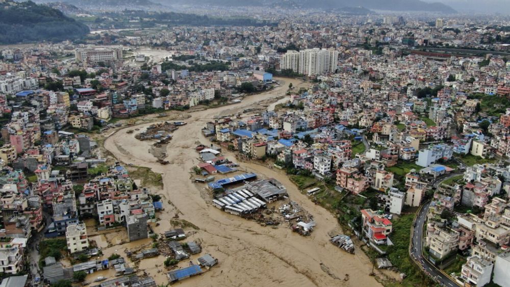 Flooding and landslides in Nepal kill at least 66 people, with as many again still missing