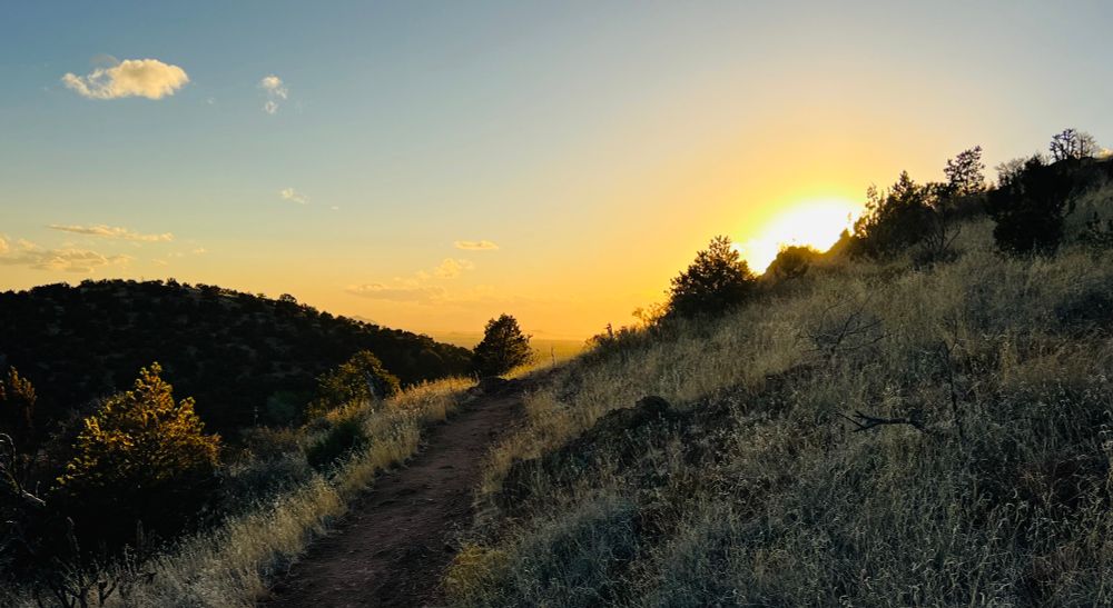 The sun setting over a trail this evening.