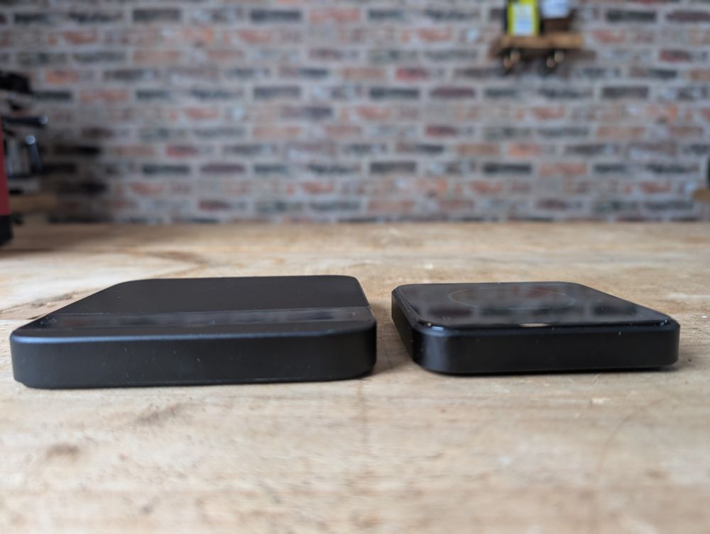 Bookoo Themis next to Acaia Lunar coffee scales