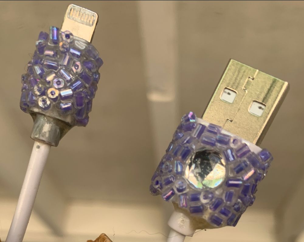 Fancy Schmancy! #USB plug and cord #blinged up during a recent #Creative #stream at Twitch.tv/GoddessWhispers 

Usb to lightning cord embellished with purple beads and clear rhinestone