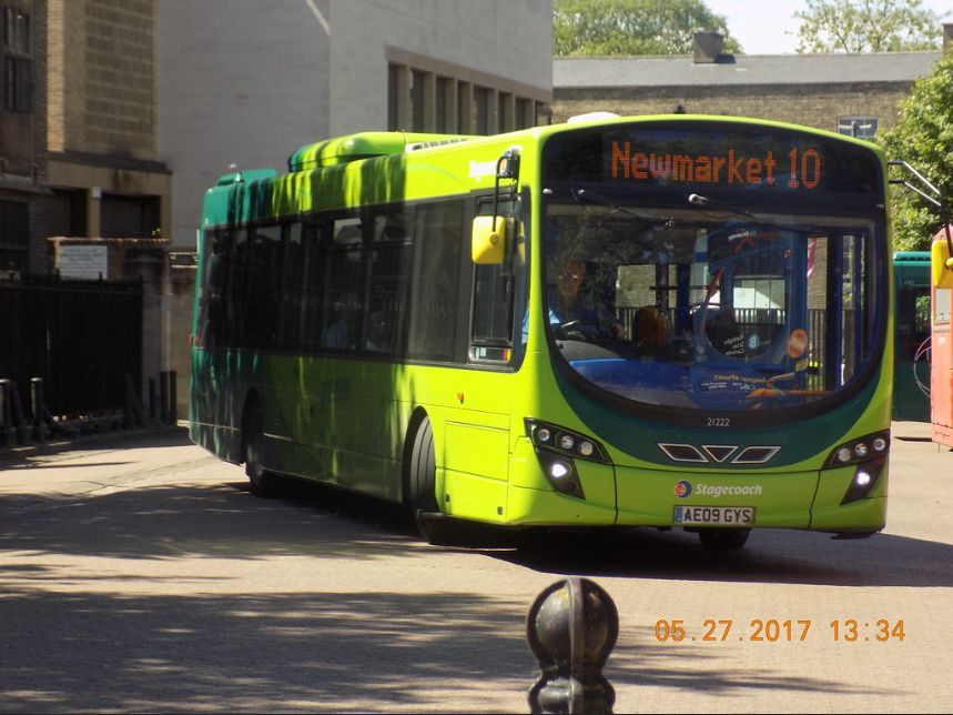 two tone single deck bus in bus station
