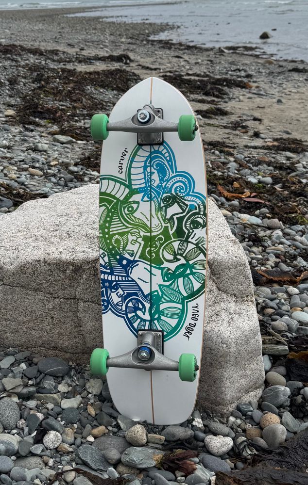 Carver Yago Dora surfskate on a beach 