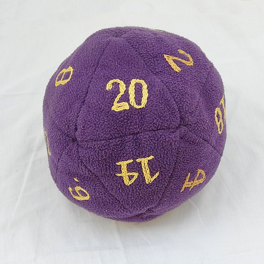 plush d20 dice, purple with golden numbers embroidered.