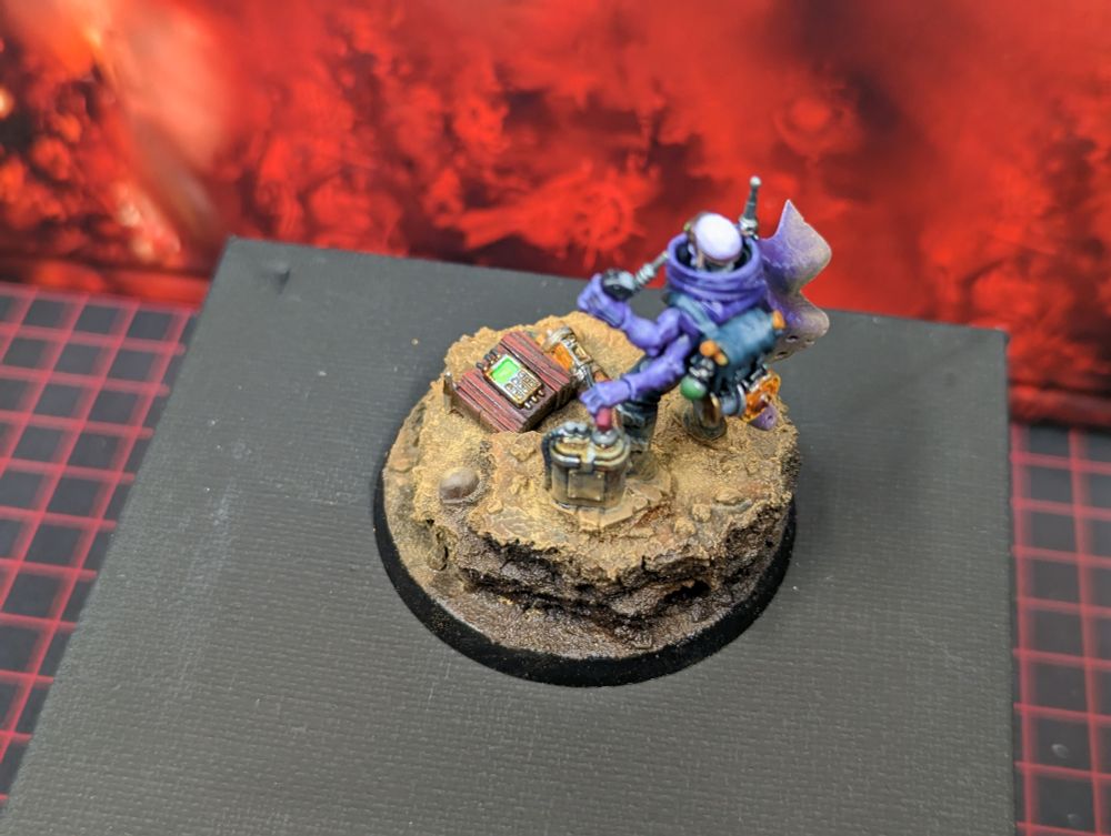 A top-down shot of a Genestealer Cults saboteur miniature.