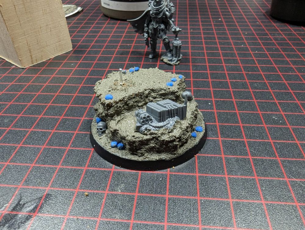 A work in progress, unpainted shot of a Genestealer Cults saboteur miniature and separate base.