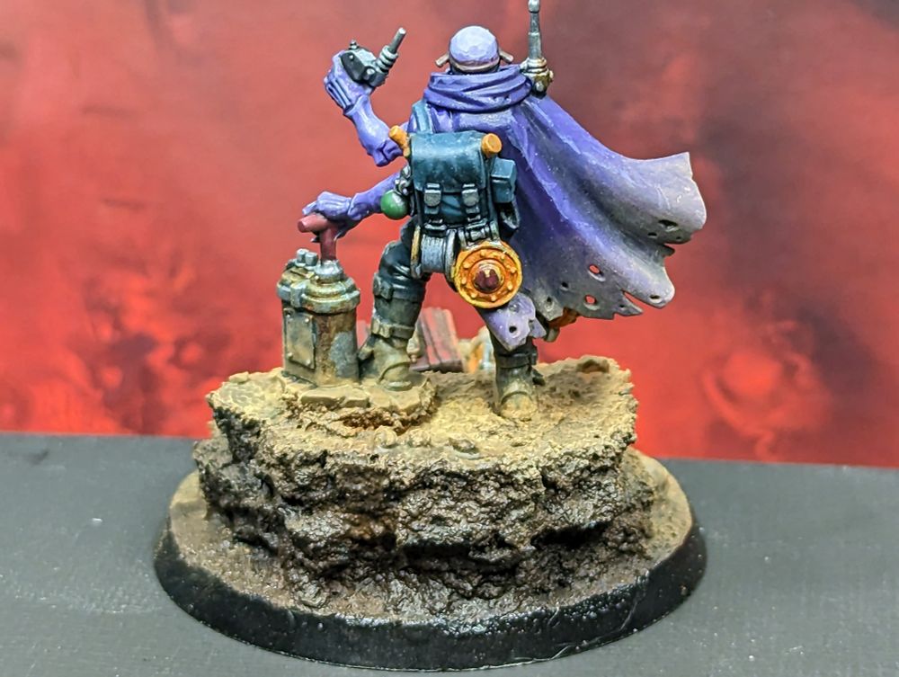 A rear shot of a Genestealer Cults saboteur miniature.