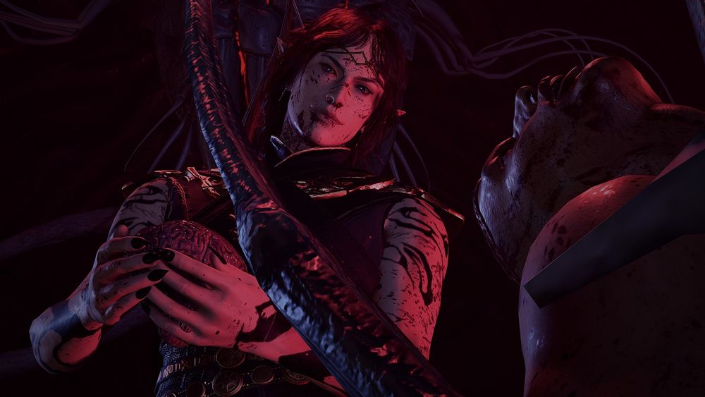 The Dark Urge from BG3 is holding a brain. 