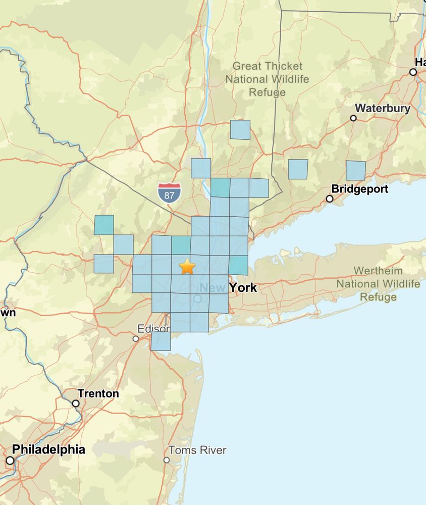 Map of NYC area with blue squares indicating where people felt the earthquake, centered just a bit northwest of the city and not extending too far 