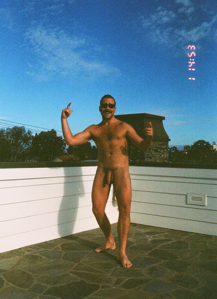 Film pic of me dancing(?) naked on a rooftop