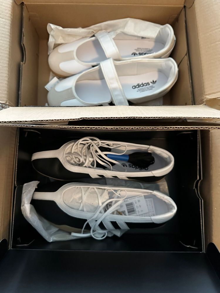 Two pairs of Adidas shoes, new in box