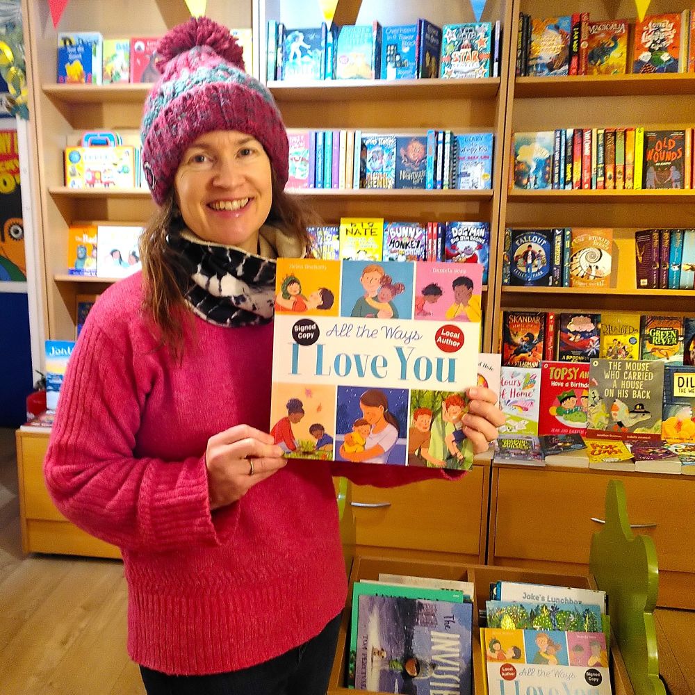 Me with a copy of my new book, All The Ways I Love You (illustrated by Daniela Sosa) in Cover to Cover bookshop