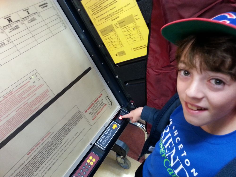 Kid in voting booth, 2016