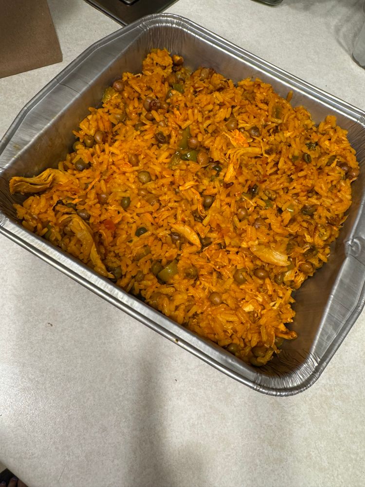 Finished, cooked arroz con pollo and gandules.
