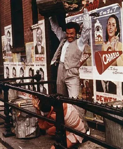 Santino Corleone beating up Carlo with a trash can in The Godfather Part I.