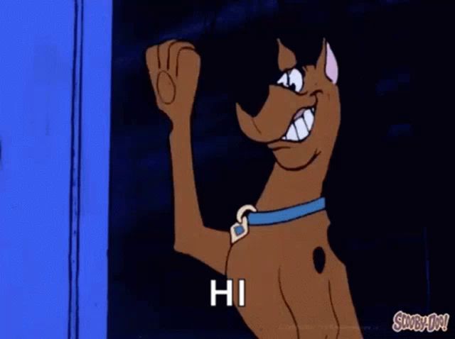 scooby doo from the scooby doo show is waving at someone