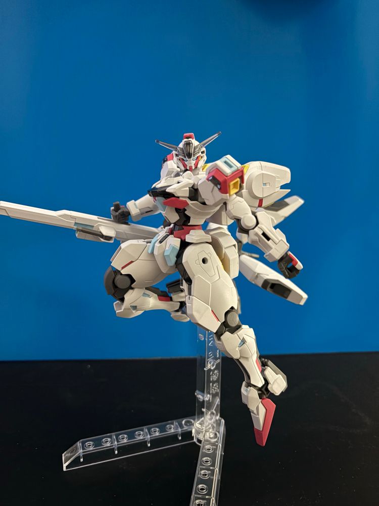 Gundam Calibarn with her broom. Customer painted to have pink and blue accents