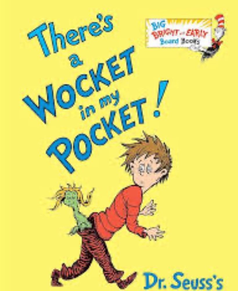 Cover of There’s a Wocket in my Pocket! White boy staring a green creature coming out of his back pocket. 