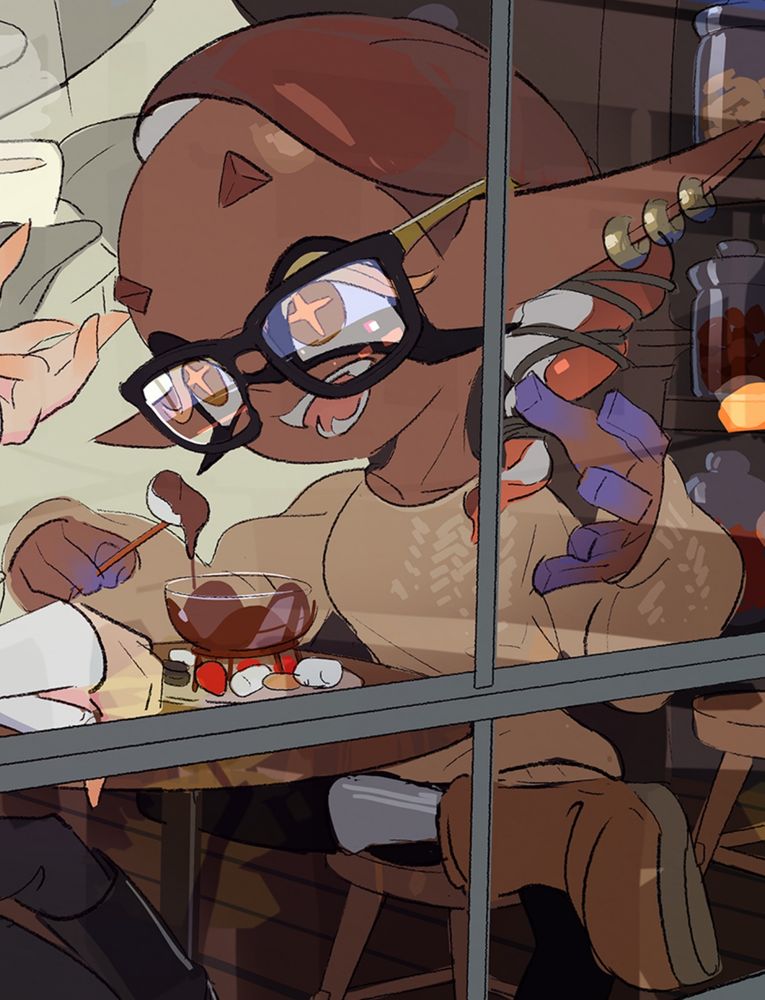 Frye’s outfit representing Team Milk Chocolate for the Feb 2025 rerun of Dark Choc vs Milk Choco vs White Choco where she’s dressed in black rimmed glasses, a light brown sweater, black leggings and brown boots. She has three gold earring on her right ear and is eating a chocolate parfait.  