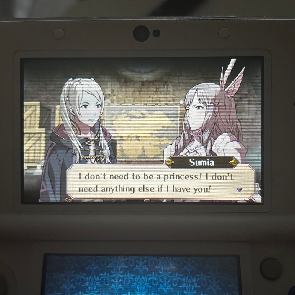 photo of my 3ds, on which i'm playing fire emblem awakening. sumia and robin are having a support conversation, in which sumia says "I don't need to be a princess! I don't need anything else if i have you!" 