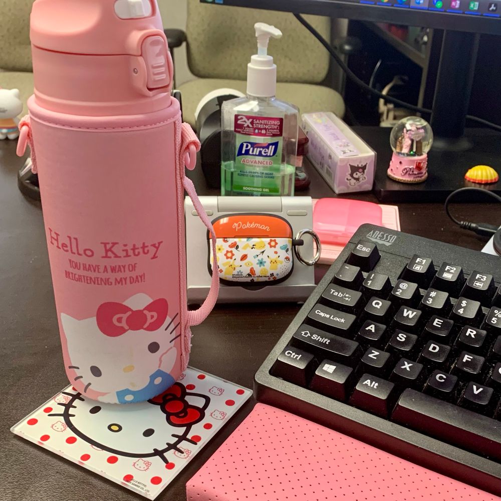 Hello Kitty coaster, water bottle, and washi tape