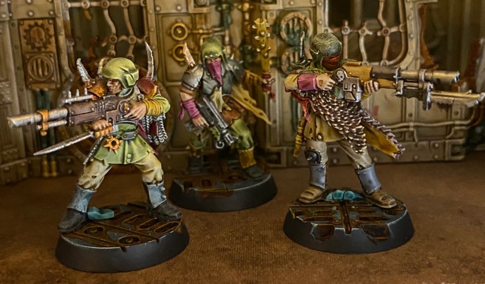 Three Traitor Guardsmen with pistol, club, knives and Lasguns 