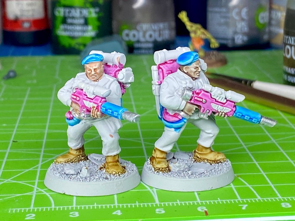 WIP Warhammer 40K 2nd edition plastic Stormtroopers with light brown boots and pink / blue painted parts. Frontside.