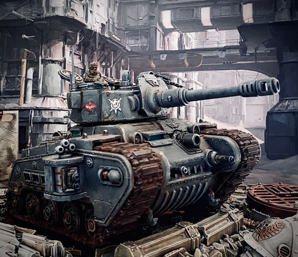 Grey Rogal Dorn Tank advancing over debris 