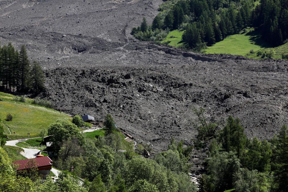 The path of a landslide, filled with rocky debris (Stefan Wermuth / Reuters)