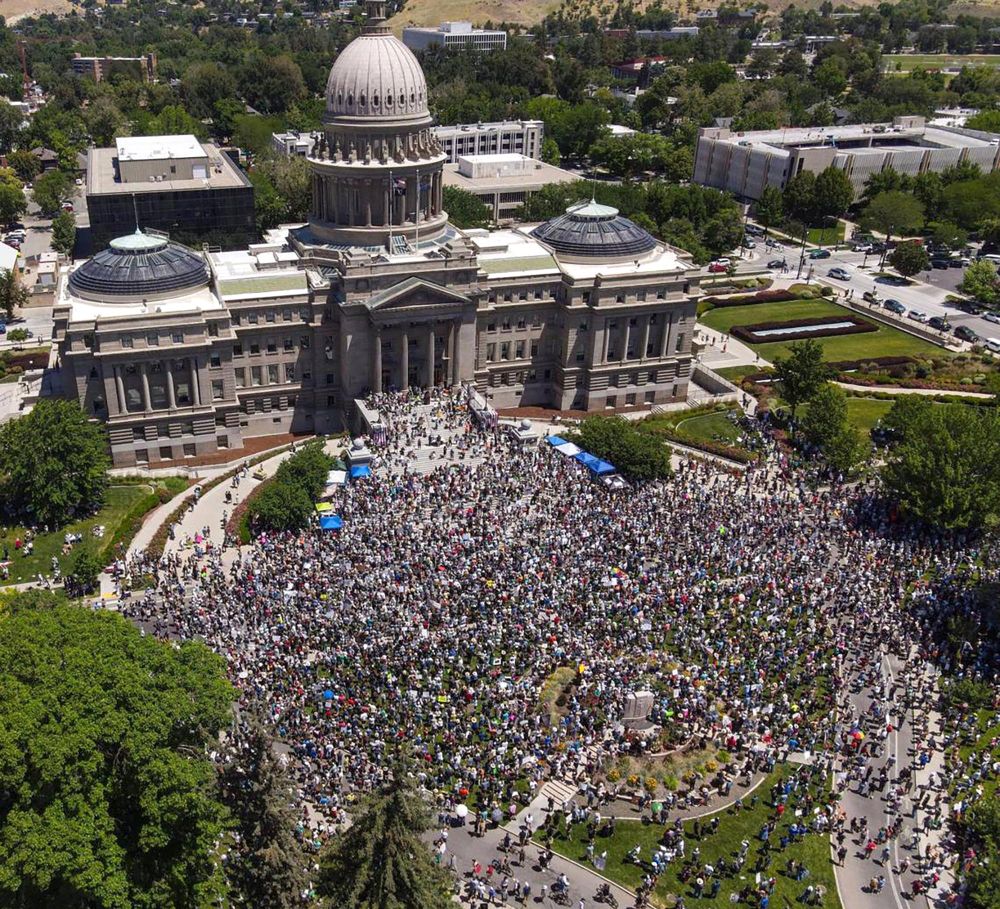 An aerial view of a large crowd of protesters standing outside the state capitol building in Boise. (Darin Oswald / Idaho Statesman / Tribune News Service / Getty)