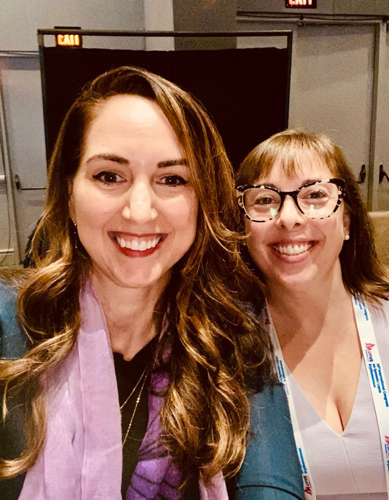 2 lupus doctors smile and wear purple clothing to raise lupus awareness 