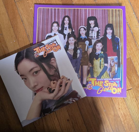 Picture of both the special edition CD and Vinyl of Twice's new Album The Story Goes On