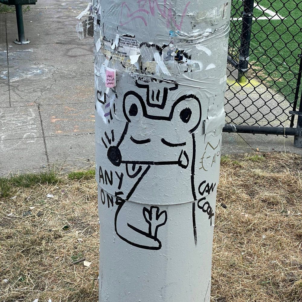 Graffiti of a crying rat chef saying anyone can cook