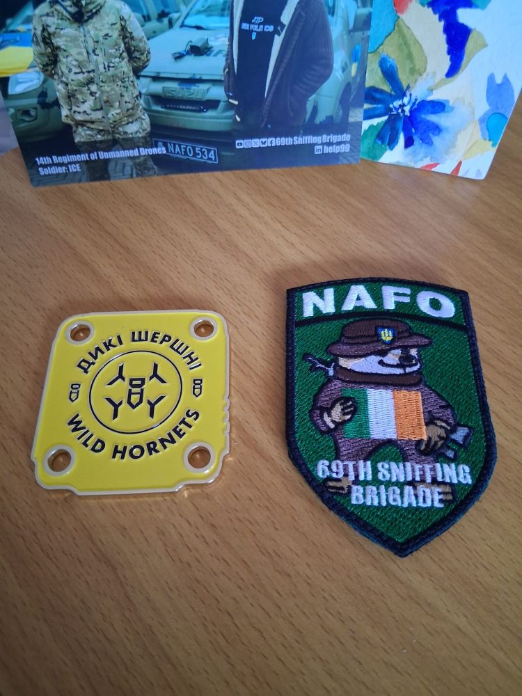 NAFO patches, including Wild Hornets and the Irish 69th Sniffing Brigade