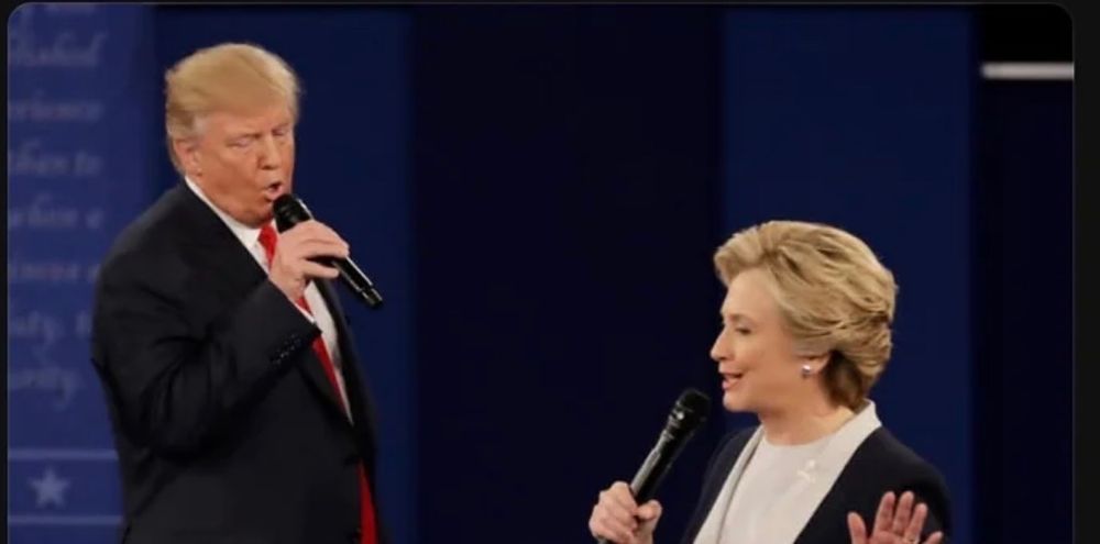 A picture with both Hilary Clinton and Donald Trump talking into microphones 