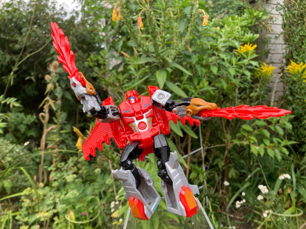 Transformers Robots in Disguise Twinferno! Very loosely inspired by F1 DoubleCross though most his own thing - a neon red bay-winged robot with dragon heads for hands and flaming blast effects swords 
