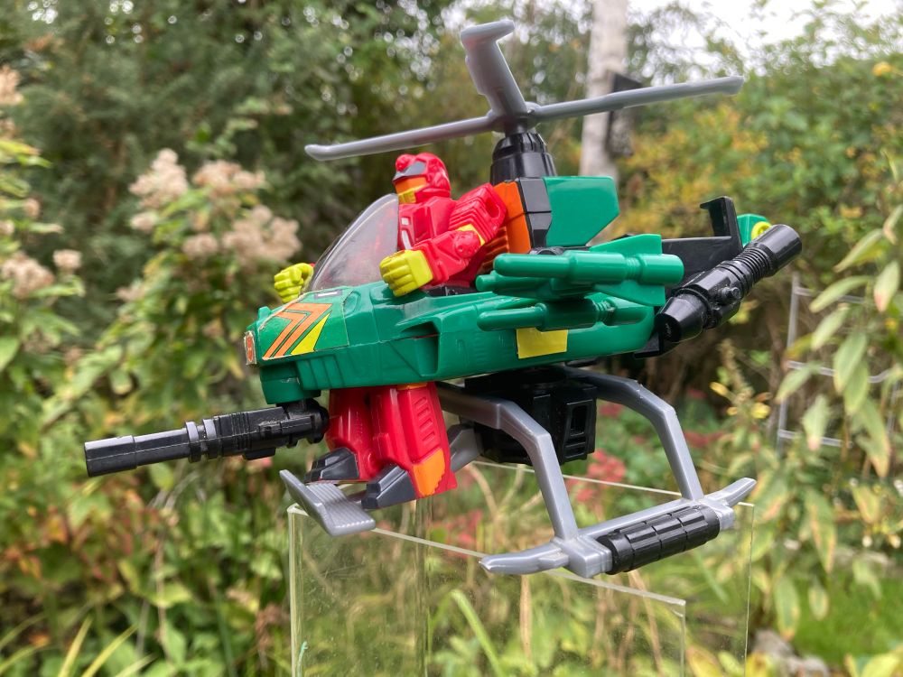 Transformers Action Master Over-Run in his Attack Copter - a pleasing combination of red robot & green helicopter 