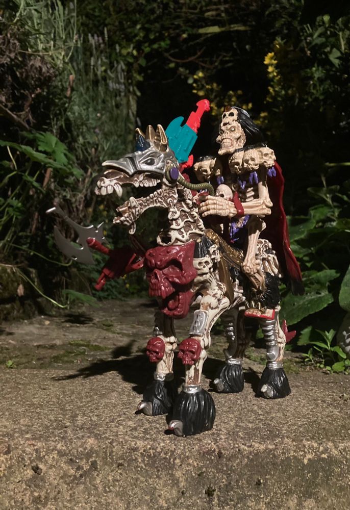 Skeleton Warriors Baron Dark riding his Skeleton Legion Warhorse 