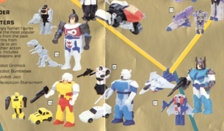 A shot from the 1989 catalogue showing the Classic Pretenders using stand-in guns. Robot bee has a Nautilator gun painted black, shell has a cut-down Powermaster Prime rifle. Jazz robot has Sludge gun, shell uses a Snapdragon gun painted white. Starscream shell uses Snaptrap’s rifle. Grimlock escapes getting a stand-in as this proto shell doesn’t have any fist holes!