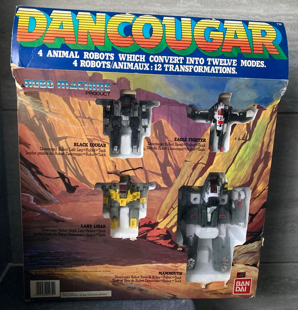 The back of the box featuring windows that show off the robot modes of the toys 