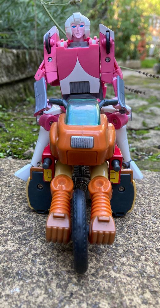 Of course it’s natural that Arcee would look great riding a motorcycle!