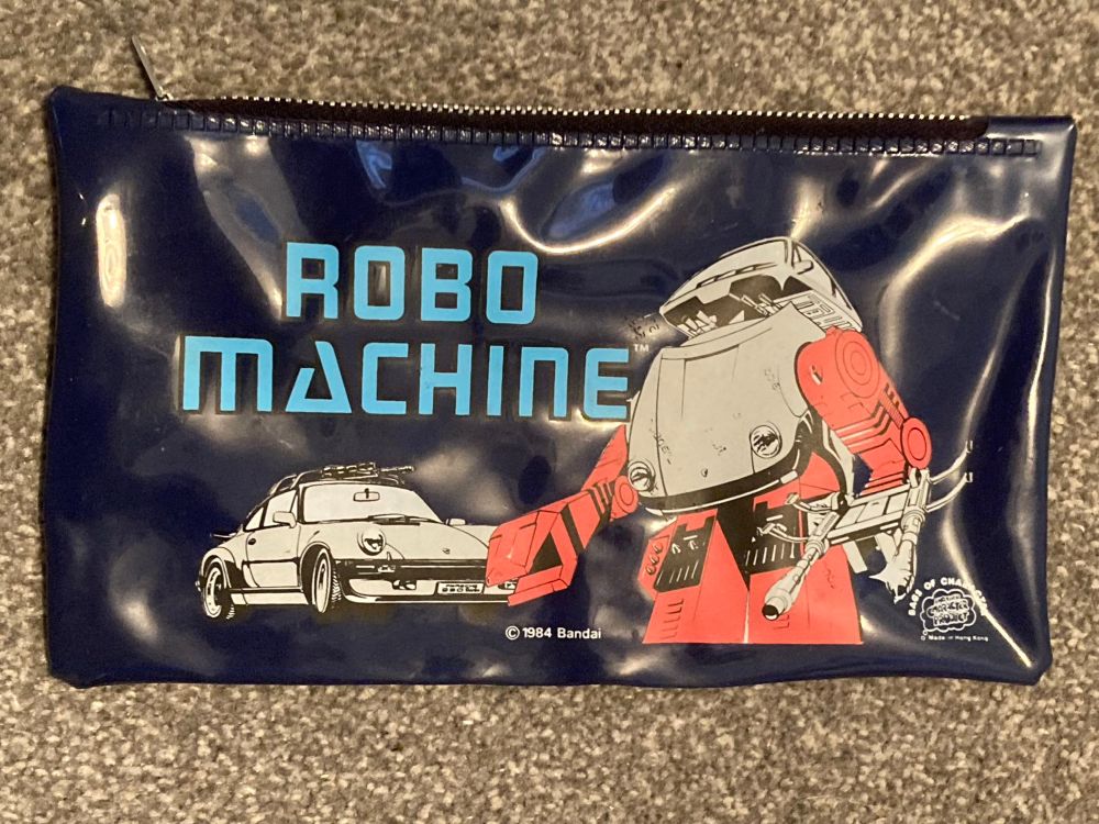 Bags of Character Robo Machine Pencil Case! - a vey shiny dark navy blue pencil case featuring art of Baron Von Joy in both modes
