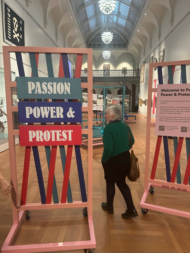 Start of the exhibition- a big sign saying Passion, Power & Protest