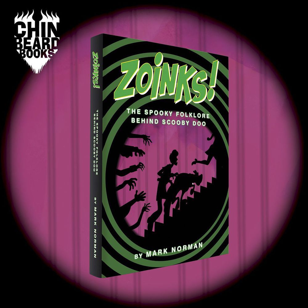 Zoinks book against a purple curtain background